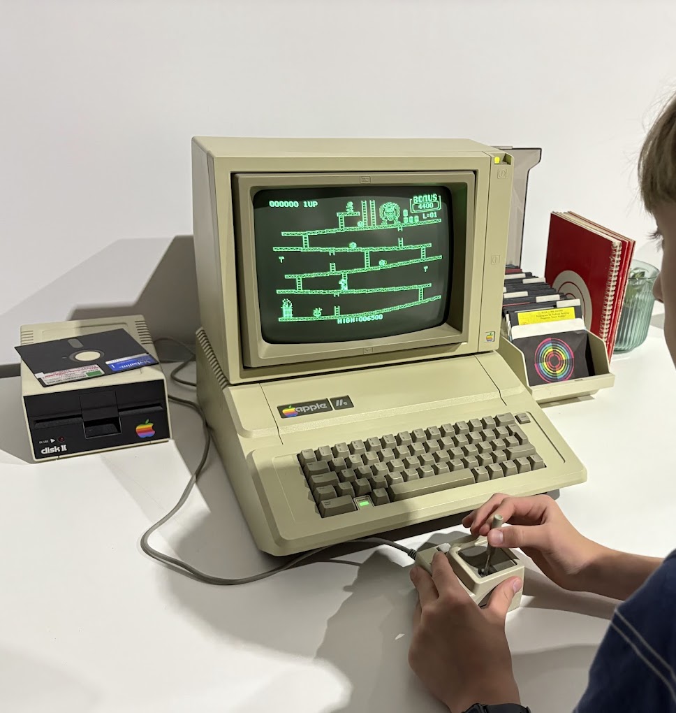 Visitor playing Donkey Kong on an Apple II at MAC Museum